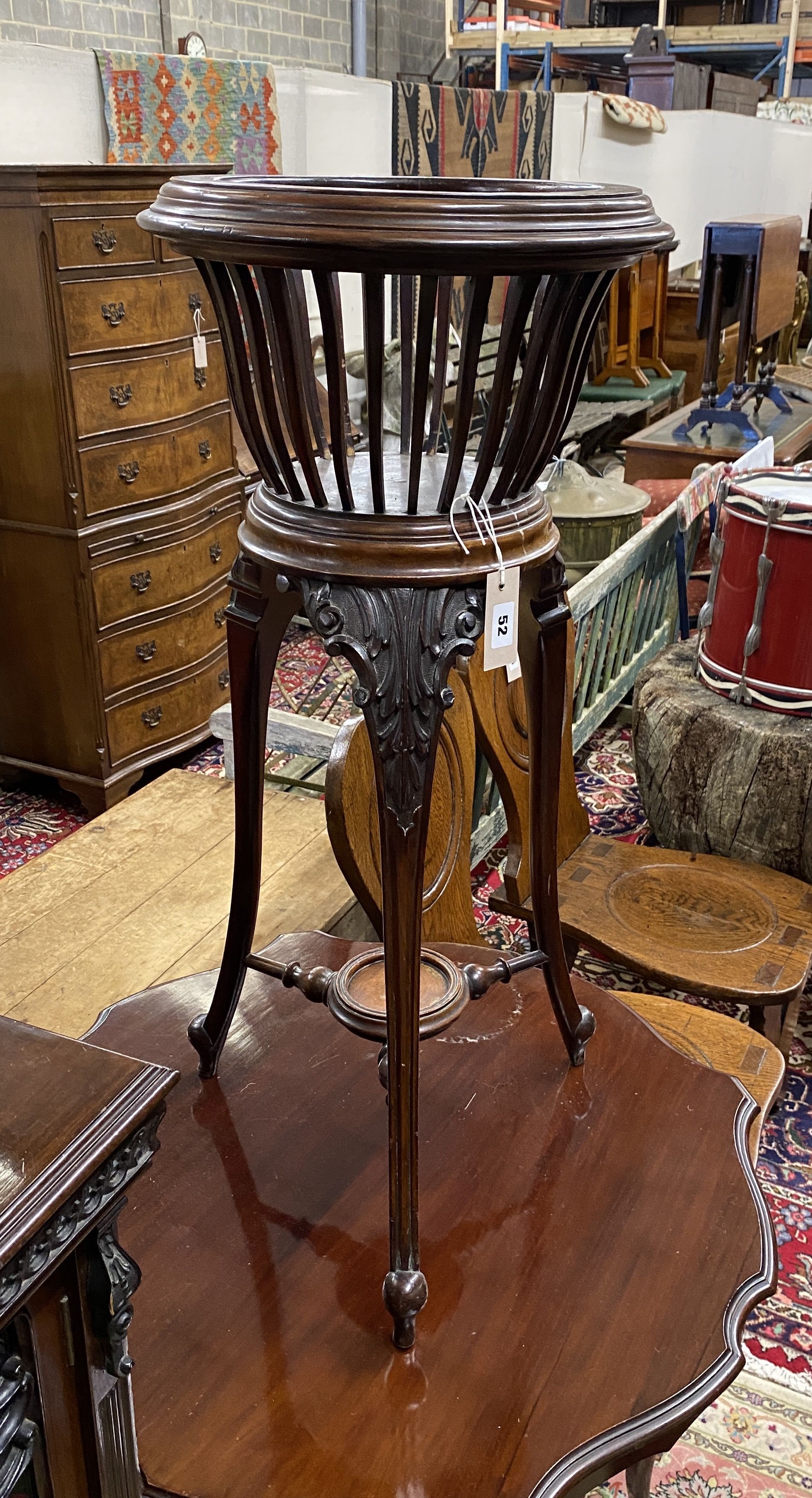 A late Victorian carved mahogany jardiniere, no liner, diameter 36cm, height 82cm